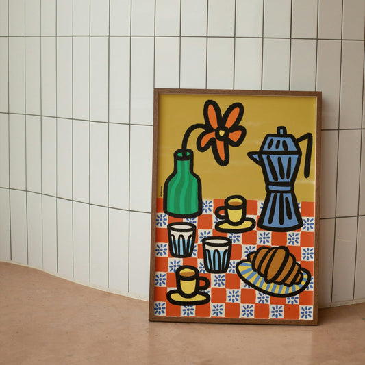 Framed artwork with colorful still life design on a tiled wall.