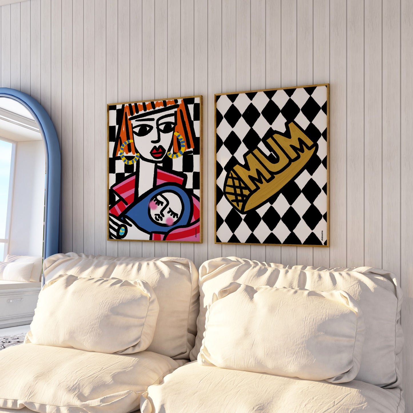 Empowered mum with bold orange hair holding baby, checkerboard backdrop, framed in black – celebrating motherhood with style and diamond mum ring print.