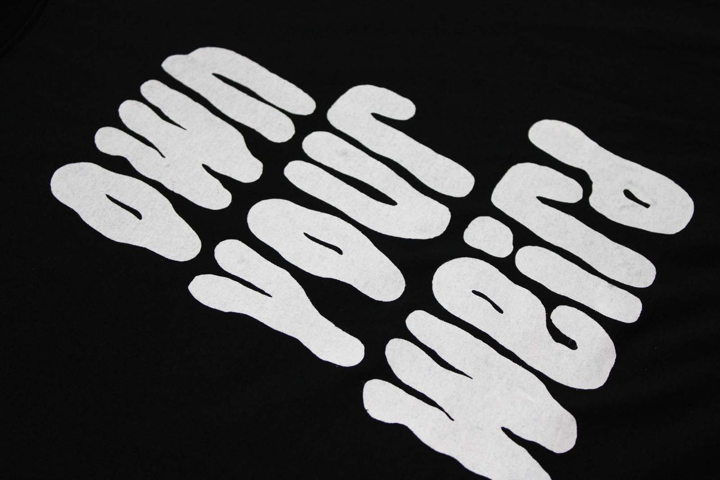 White Own your weird type on a black tshirt background