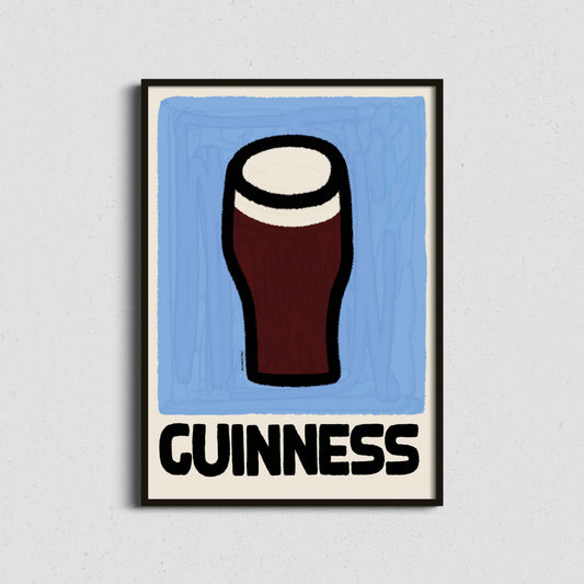 Framed Guinness poster with a glass of beer on a blue background
