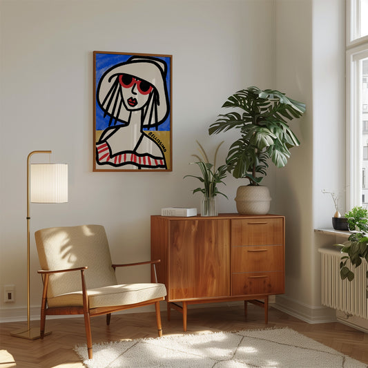 Modern living room with wooden cabinet, chair, and chic female illustration in sunglasses art on wall