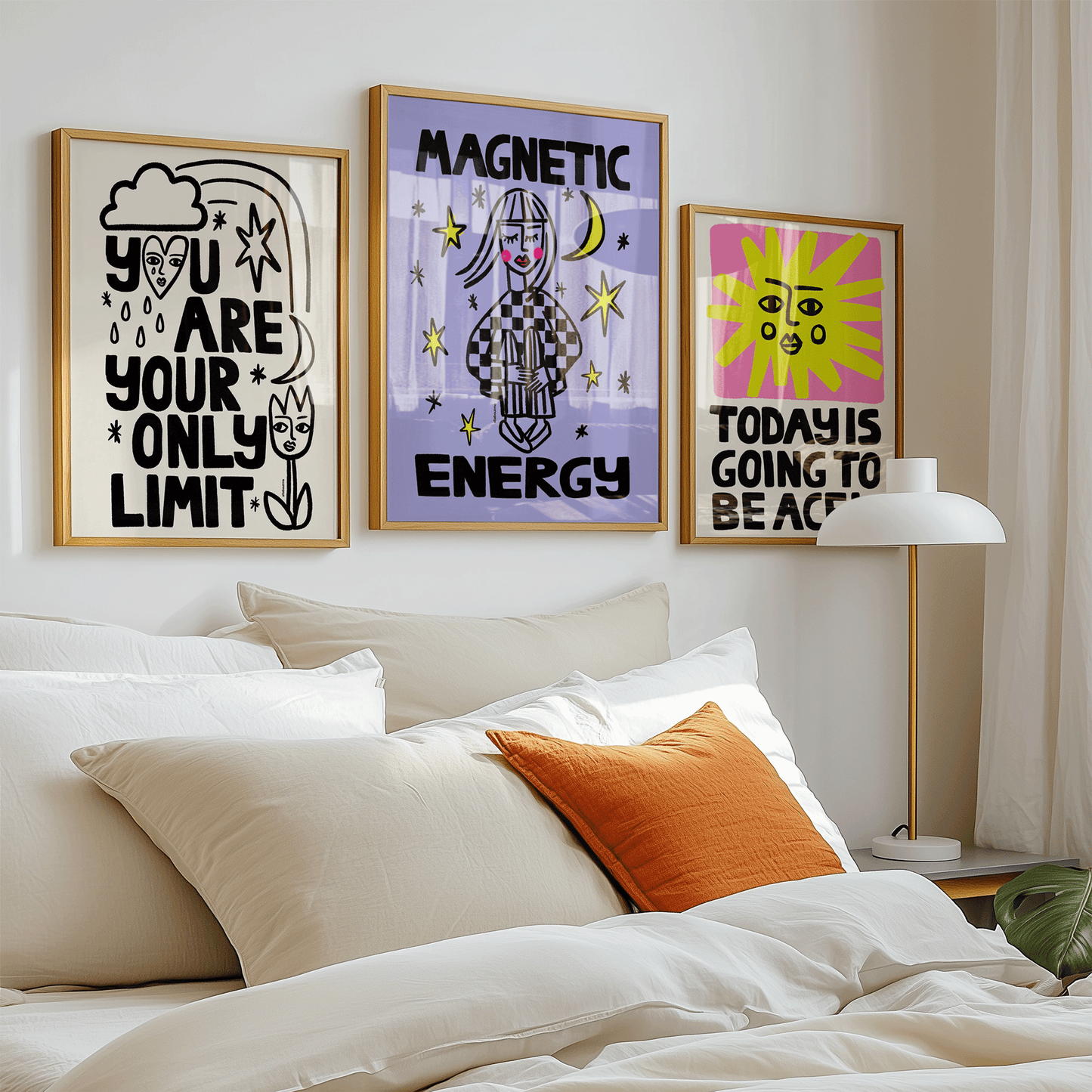 Decorative wall art above a bed with motivational phrases