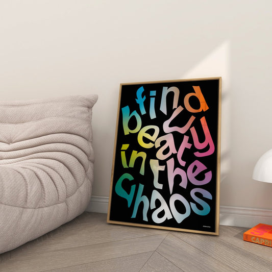 Colorful framed poster with motivational quote in a modern living room.