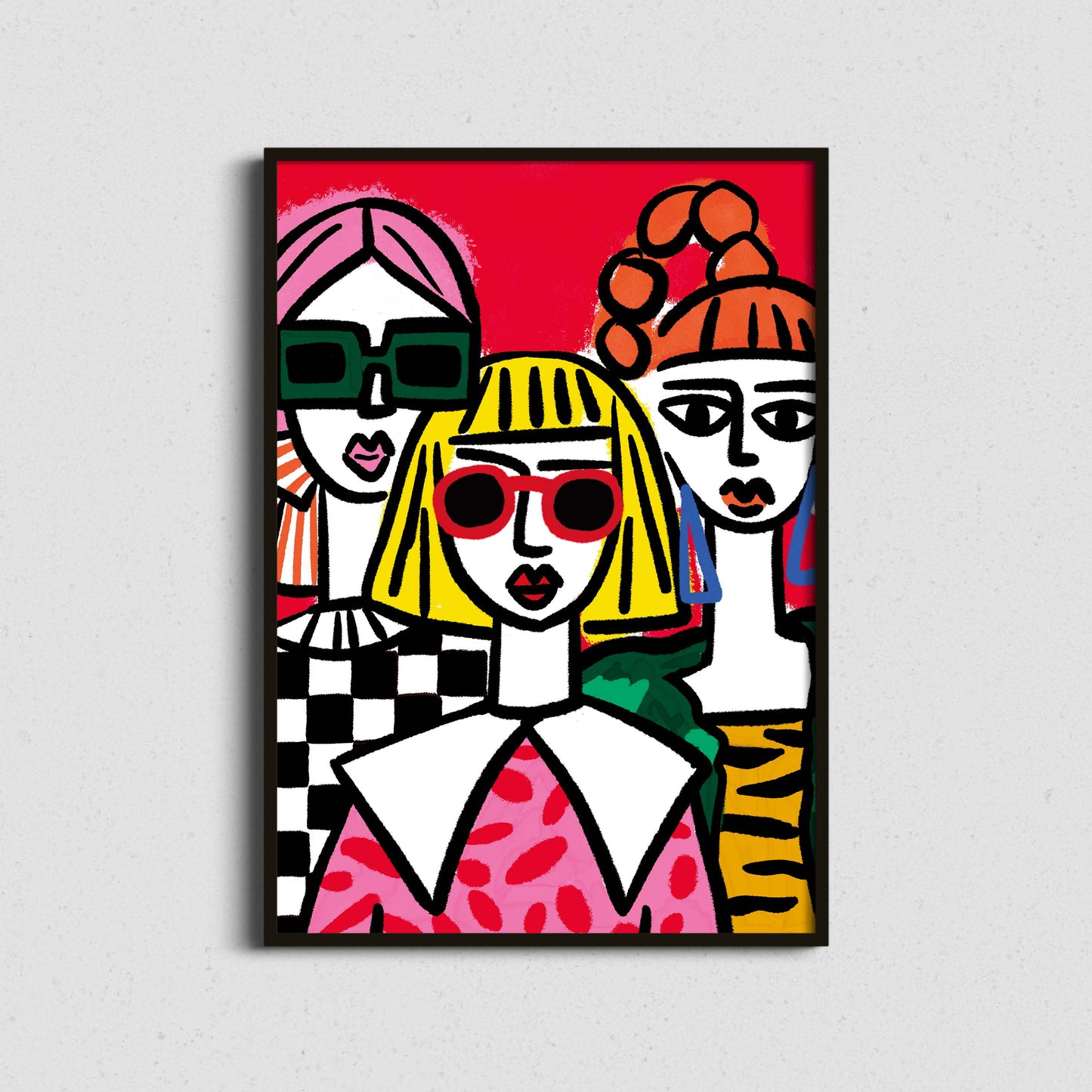 Colourful abstract art print of three stylised figures on a white wall.