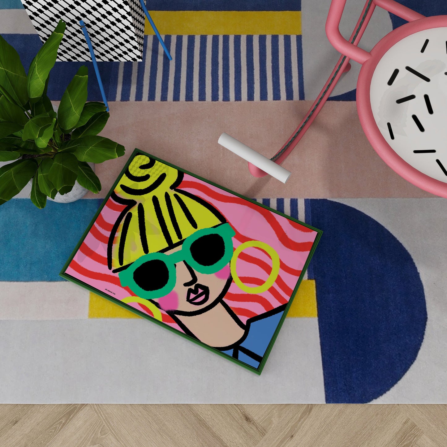 Colorful rug with a female design of a person wearing sunglasses on a geometric-patterned floor.