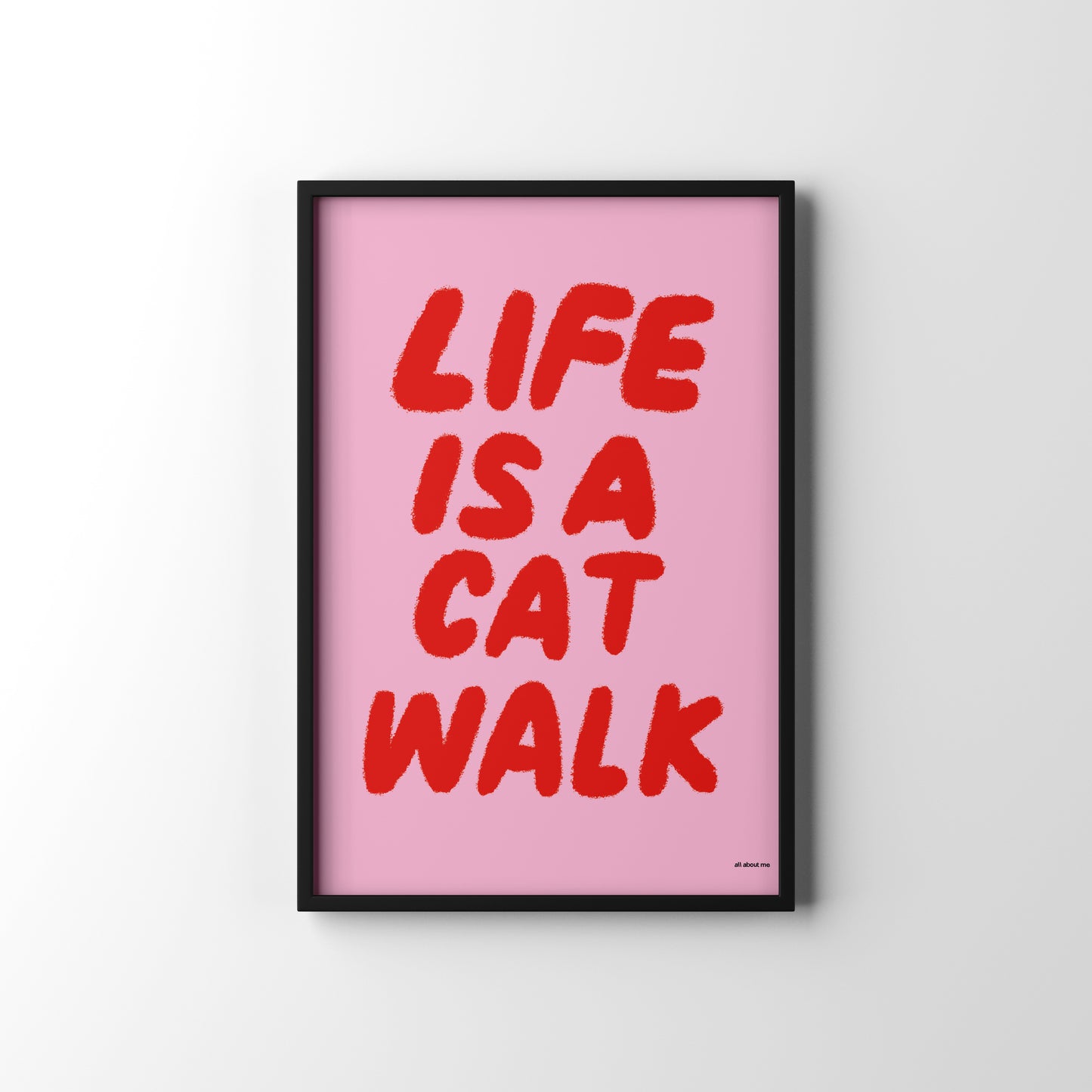 Framed poster with 'Life is a Cat Walk' text on a pink background