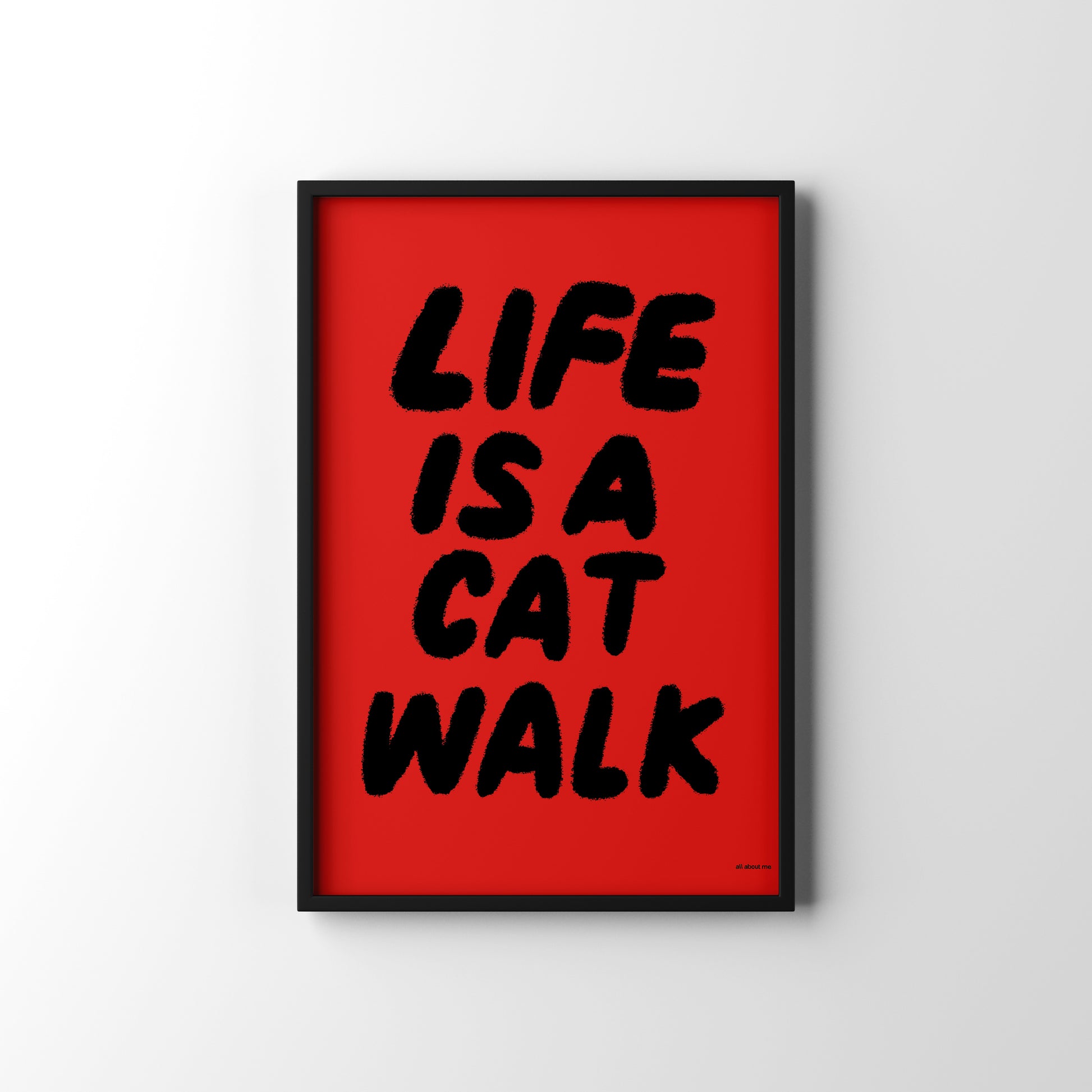 Framed poster with 'Life is a Cat Walk' text on a red background