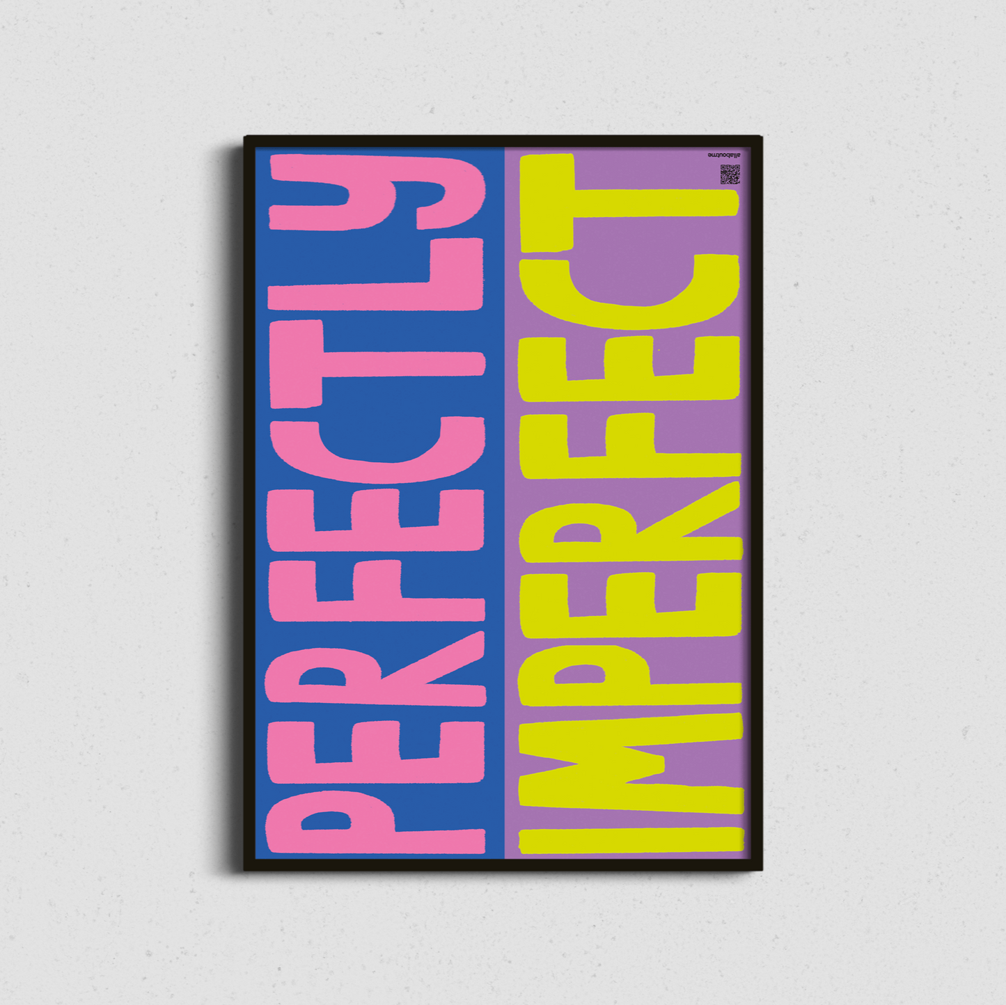 Framed poster with 'Perfectly Imperfect' text in pink and yellow on a blue background.