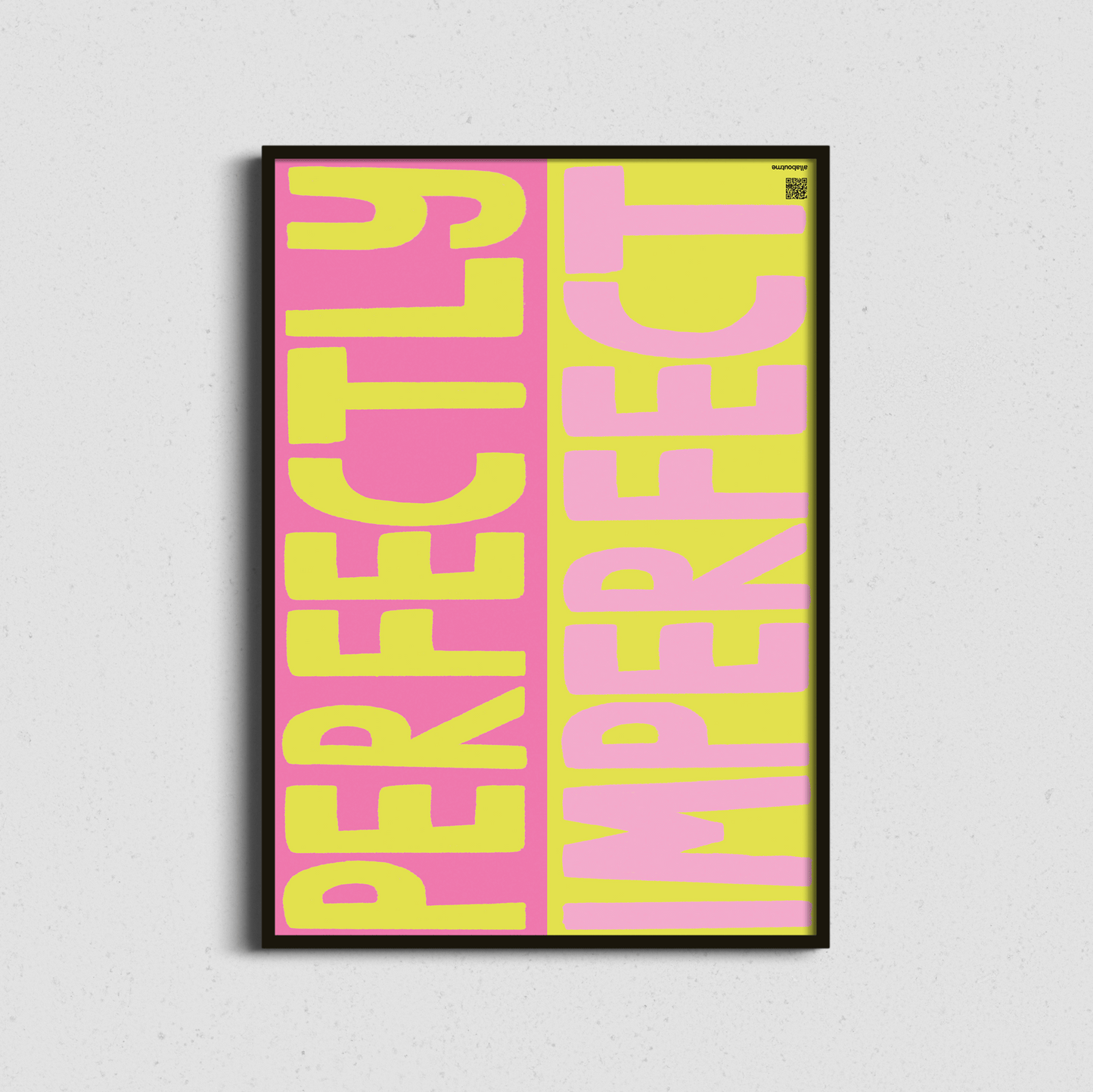 Framed poster with 'Perfectly Imperfect' text in pink and yellow on a light gray background