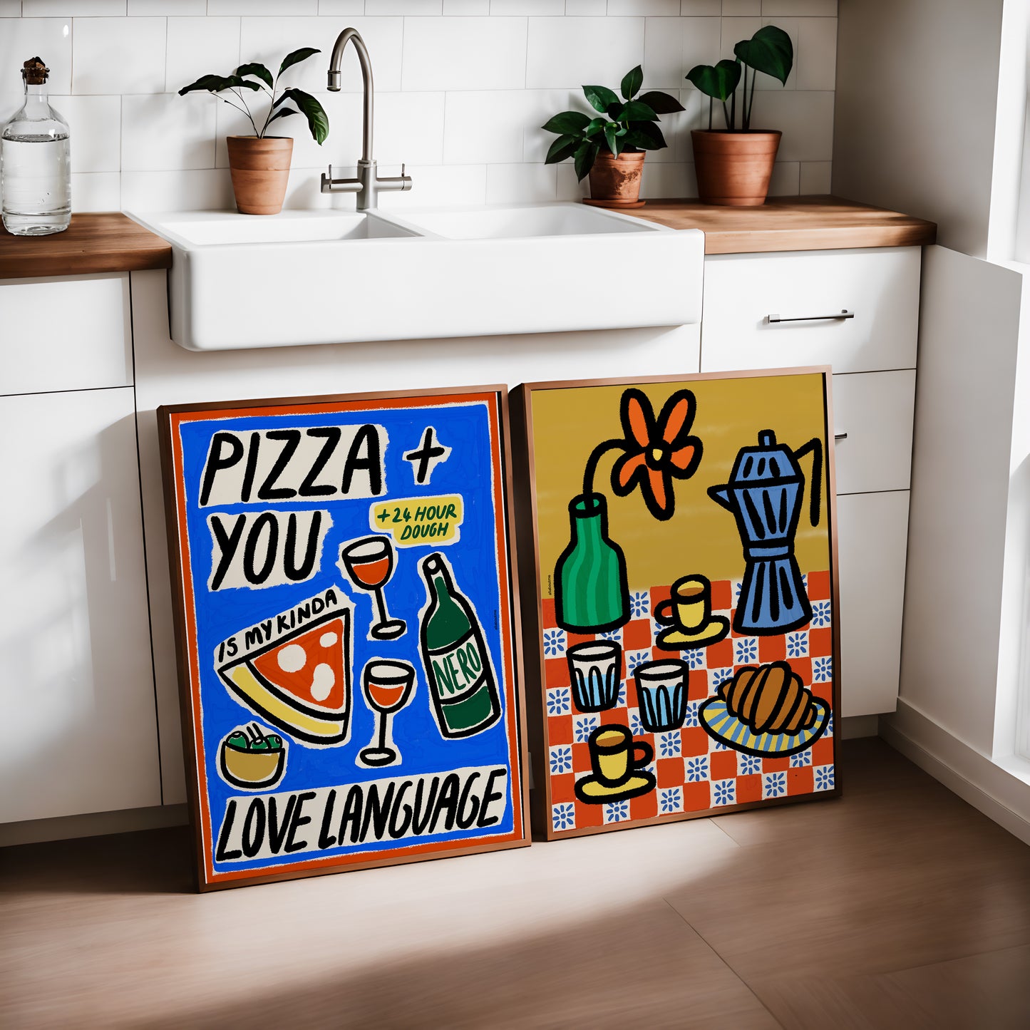 Two dolce vita Pizza & coffe colorful framed artworks in a kitchen setting.