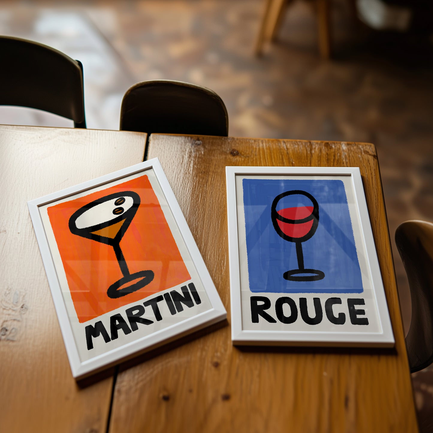 Expresso Martini and red wine rouge framed art on kitchen table.