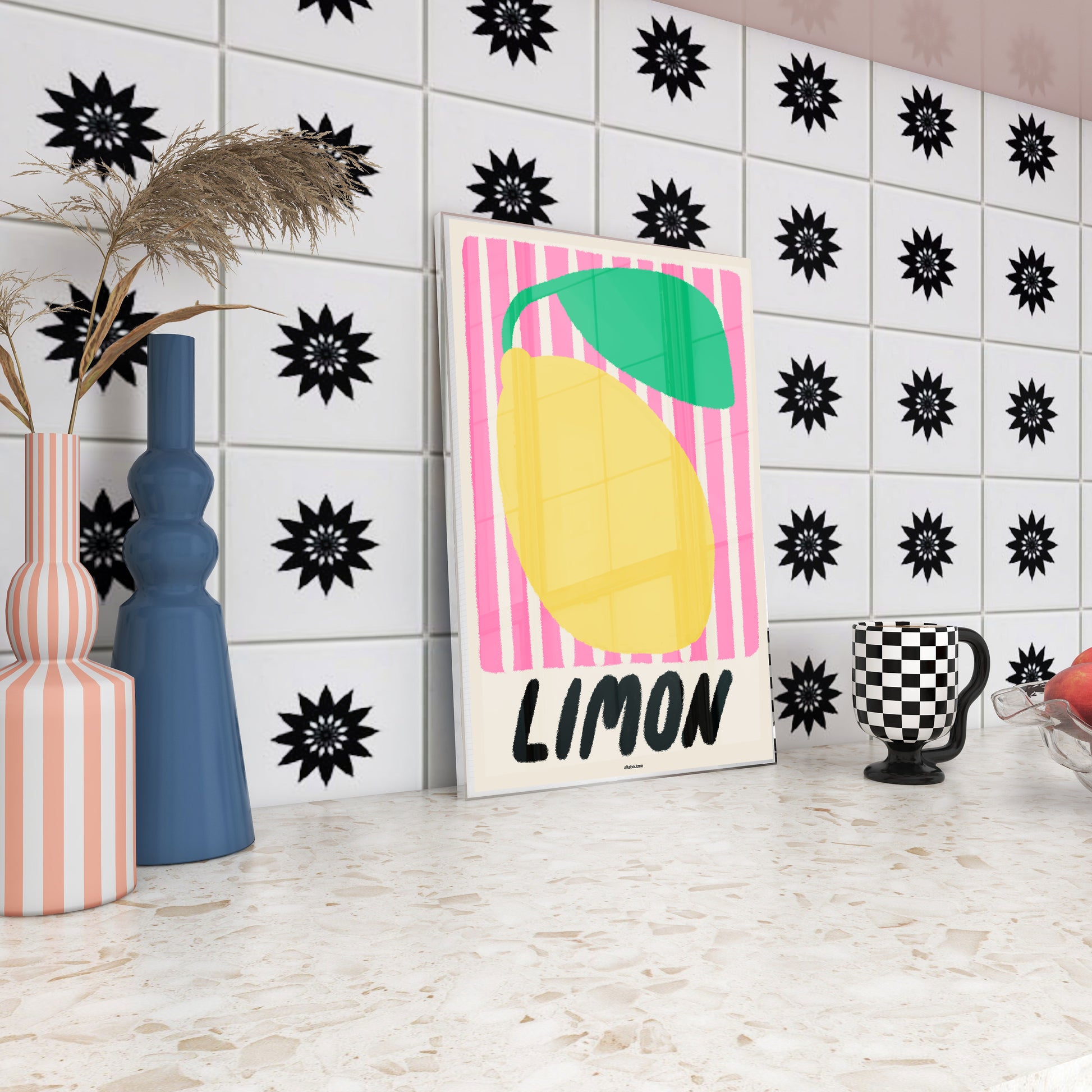 Colorful lemon-themed artwork with 'Limon' text on a tiled wall.
