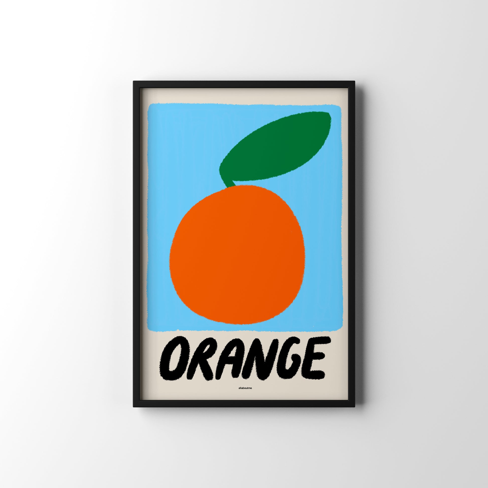Framed poster of an orange with a blue background and black text on a white wall.