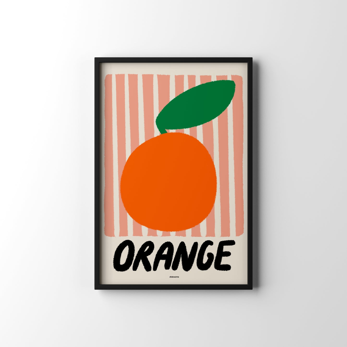 Framed poster of an orange with a green leaf on a striped background