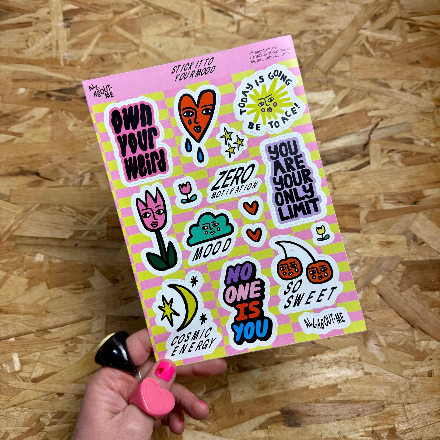 Sticker sheet with16 colourful Stick it to your mood Stickers  with motivational phrases, colourful designs.