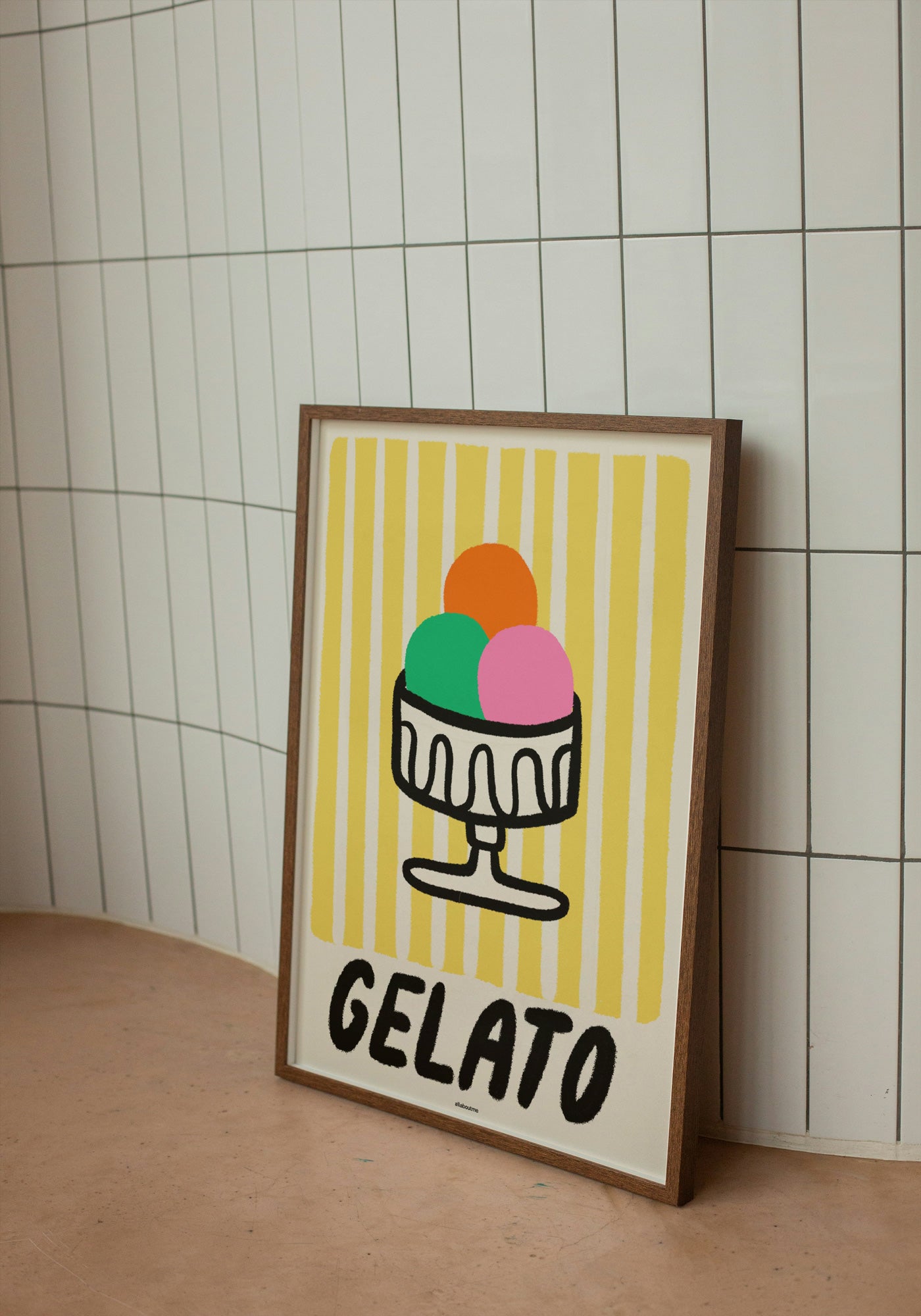 Framed poster of a gelato illustration with 'GELATO' text against a tiled wall.